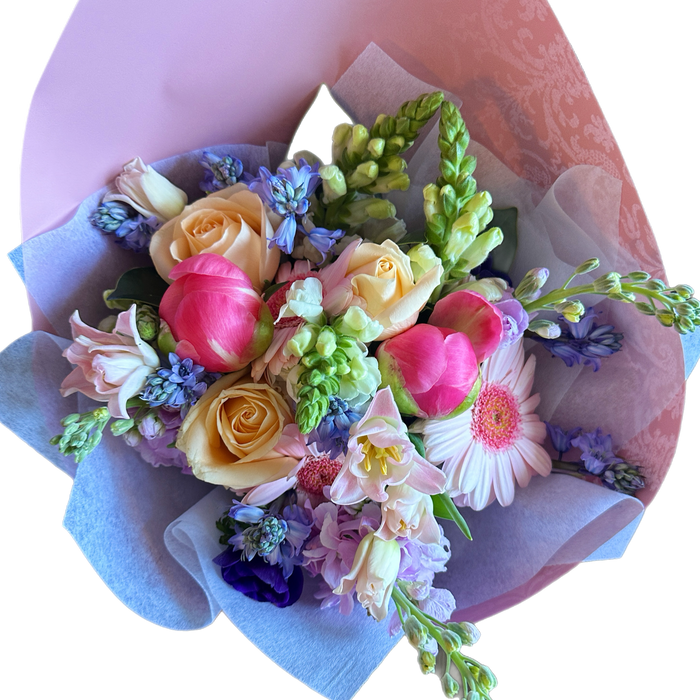 Elegant pastel floral arrangement by Becca Florist, a handcrafted display of Wellington's finest seasonal flowers, deliverable only within the Wellington region.